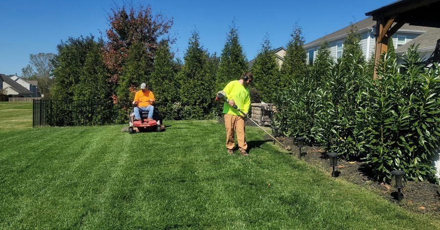 Lawn crew working a residential property